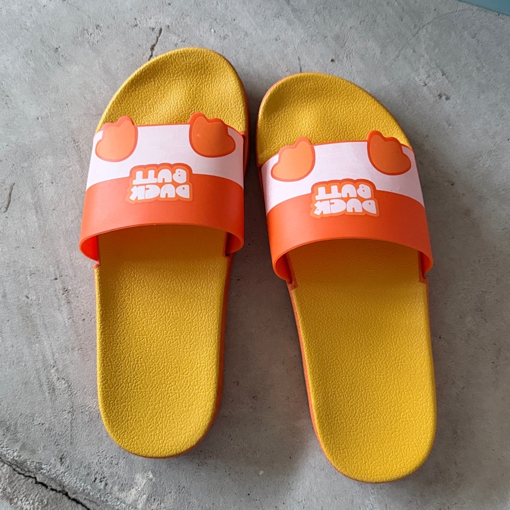 Duck Butt Orange and Yellow Slides